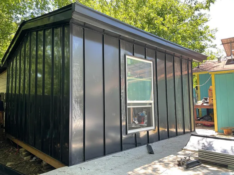 Black standing seam metal wall panels for Roof Inspection in Cloverdale