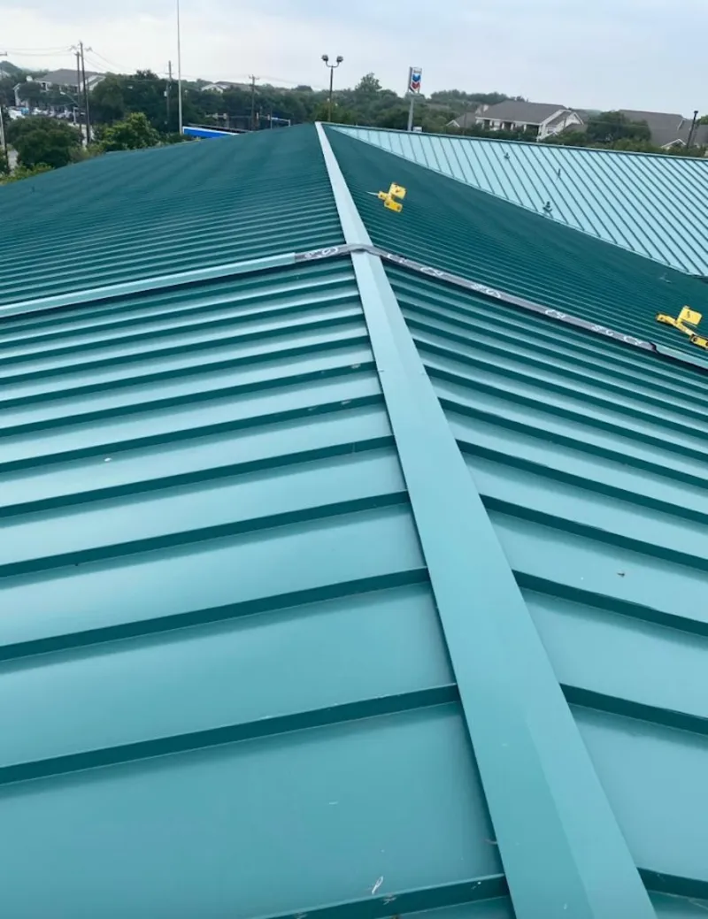 Green commercial metal roof ridge and valley for Metal Roof Repair in Cloverdale